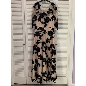 Tahari nude and black gown with bateau neckline
